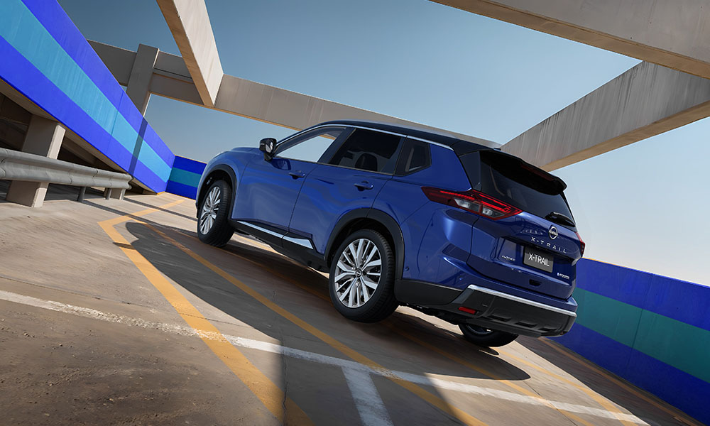 Rear 3/4 shot of a Blue hyrbid SUV