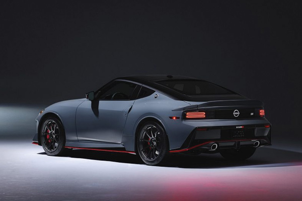 Rear of a Nissan Z model on a dark sound stage